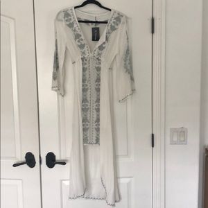 While hi low cotton embroidered dress